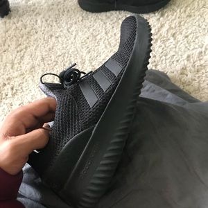 Black Adidas sneakers
